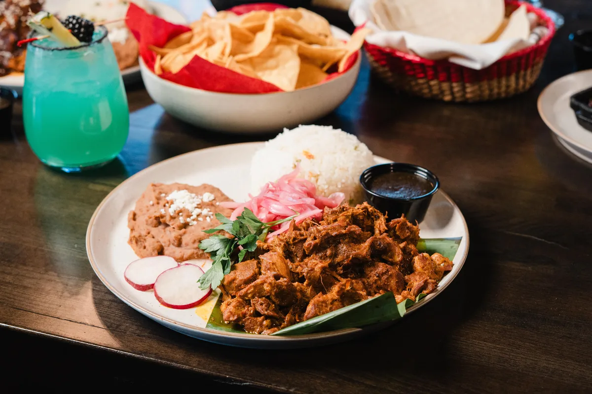 Cochinita pibil plate at Alebrijes